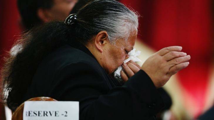 Goodbye: Mother of Jonah Lomu, Hepi Lomu, prays during a public memorial service for her son. Photo: Hannah Peters