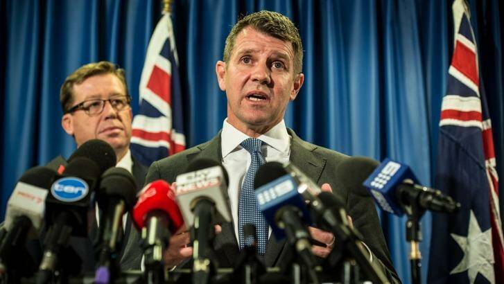 Mike Baird and Deputy Premier Troy Grant announce the greyhound racing reprieve on Tuesday. Photo: Wolter Peeters