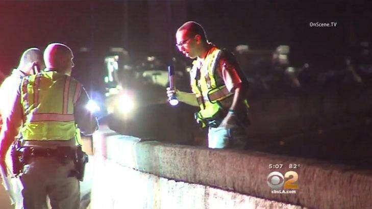 Police at the scene on the 101 Freeway. Photo: Courtesy of CBS News
