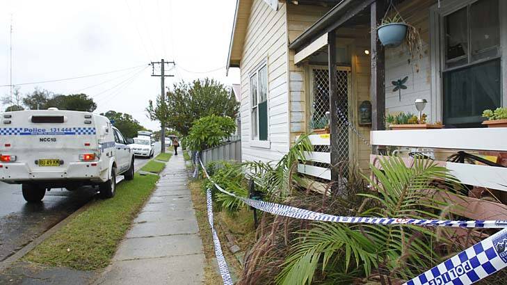 Murder mystery: police cordoned off Anthony O'Grady's home. Photo: Max Mason Hubers