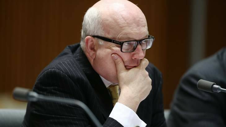 Attorney-General George Brandis would not confirm whether cabinet is considering a proposal to change FOI charges. Photo: Alex Ellinghausen