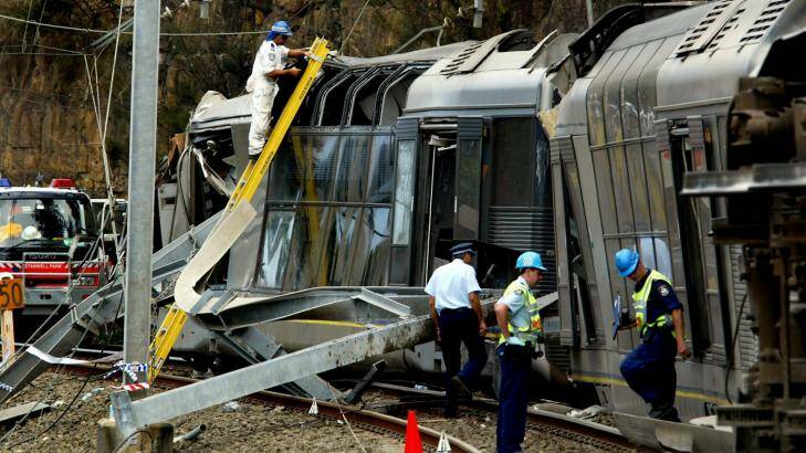 The Waterfall train crash in 2003 highlighted the lack of communication equipment on Sydney trains. Photo: Orlando Chiodo
