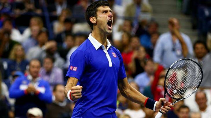Champion: Novak Djokovic celebrates during his win over Roger Federer. Photo: Clive Brunskill