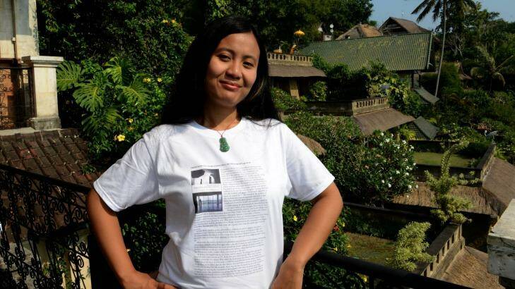 Silenced: Indonesian novelist Eliza Vitri Handayani wears her work in Ubud after a session launching her latest work was cancelled. Photo: Sonny Tumbelaka