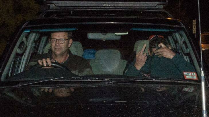 Mark Tromp leaves the Wangaratta Police Station (right) at night after being found. Photo: Mark Jesser