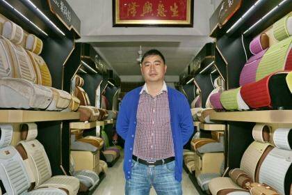 Shopowner Huang says orders have halved since last year. Photo: Sanghee Liu