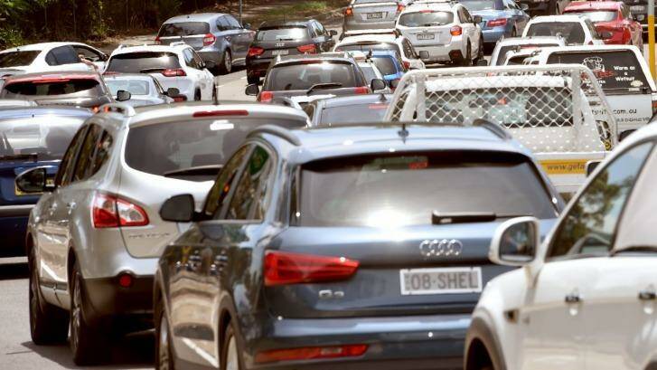 Motorists queued for up to 15 kilometres around the state on Monday. Photo: Steven Siewert