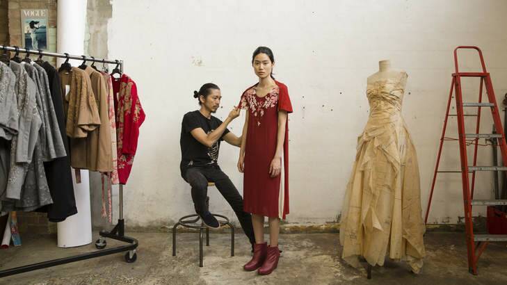 Designer Akira Isogawa with model Woan Ni Wooi. Photo: Anna Kucera