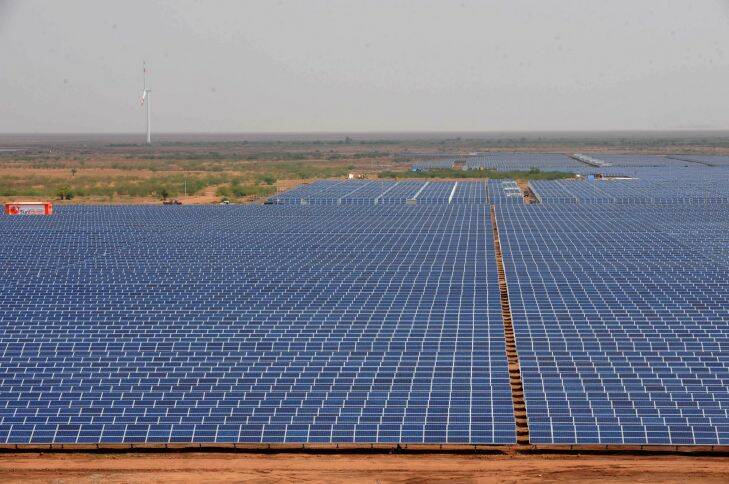 (FILES) In this photograph taken on April 14, 2012, solar panels are pictured at the Gujarat solar park at Charanka village of Patan district, some 250 kms from Ahmedabad. India's prime minister urged global companies on April 17, 2013 to make the sun-baked South Asian nation a solar energy hub as the country seeks to cut its chronic power shortages. AFP PHOTO/Sam PANTHAKY/FILES