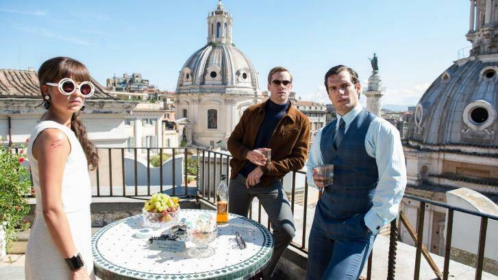 Elegant operatives: (From left) Alicia Vikander as Gaby, Armie Hammer as Illya  and Henry Cavill as Solo in <i>The Man from U.N.C.L.E.</i> Photo: Supplied