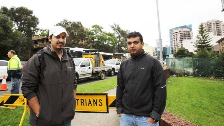 Pulkit Sunger and Kunal Gohlan said they had not heard anything about when they could return to the Parkes Street building. Photo: Isabella Lettini 