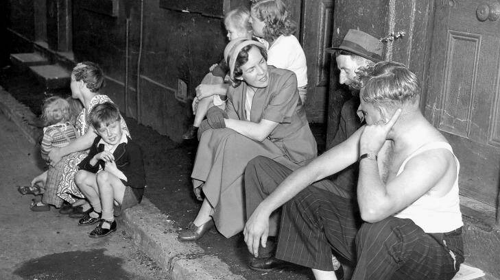 Ruth Park talks with Surry Hills' locals about the government scheme that eventually razed their homes. Photo: From Rich and Rare