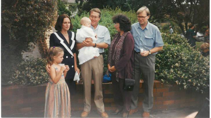 Lives entwined: Swan, his wife Kim and daughter Libbi with Kevin Rudd and his wife Therese at the baptism of Swan's son Matt in 1995 - Rudd was godfather. Photo: courtesy of Wayne Swan