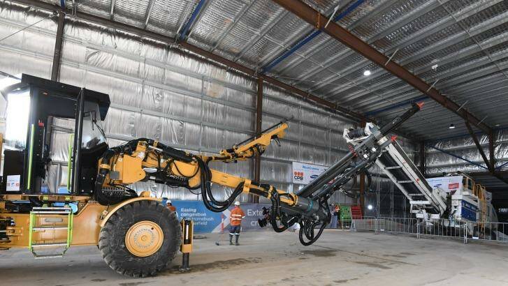The first excavating equipment for the WestConnex tunnels makes its way down a ramp at Concord on Monday.  Photo: Peter Rae 