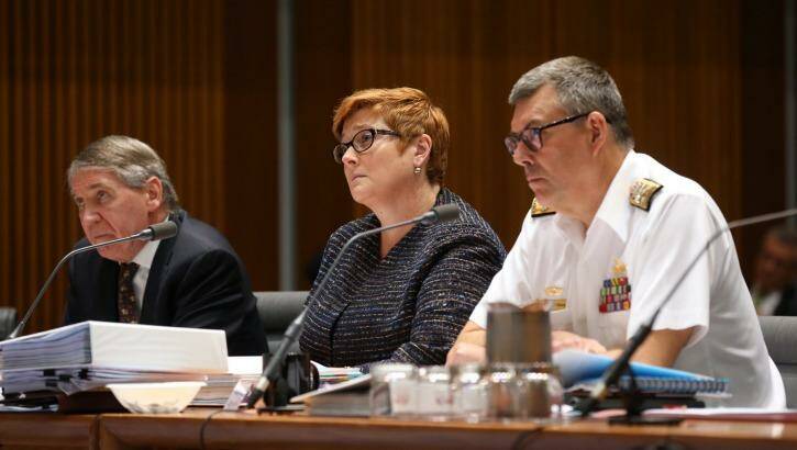 Defence secretary Dennis Richardson, pictured with Senator Payne and acting CDF Vice Admiral Ray Griggs, said there had been the "odd hiccup" with the unusual arrangement. Photo: Andrew Meares