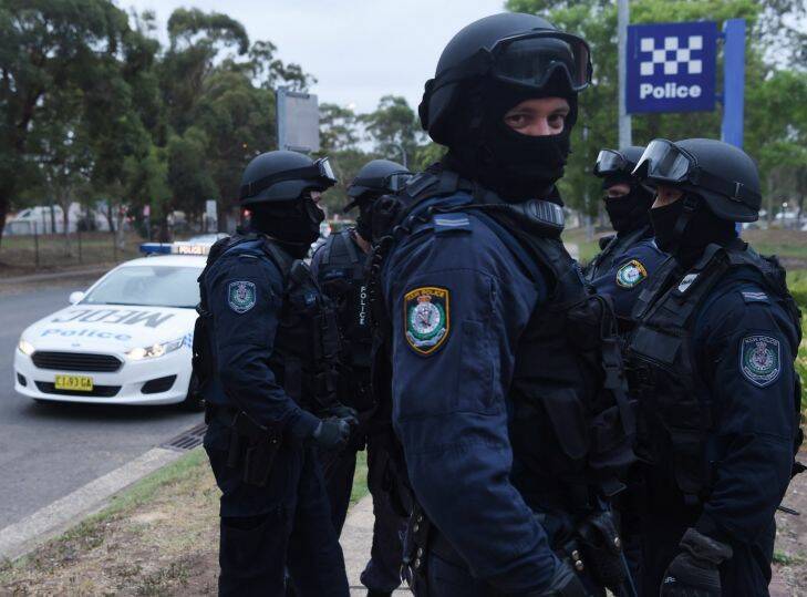 CRIME?? 
Middle Eastern organised crime squad of the NSW Police Force raid a house in Wakeley in Western Sydney to look for suspected firearms.
Photo Nick Moir
3?? feb 2017