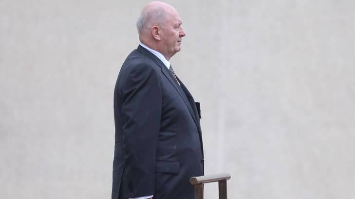 Sir Peter pictured arriving for the ceremony at Parliament House on Friday.