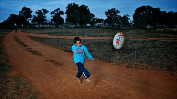 Kicking for glory: Dale Harris from Wilcannia plays with the local club. Photo: Brendan Esposito