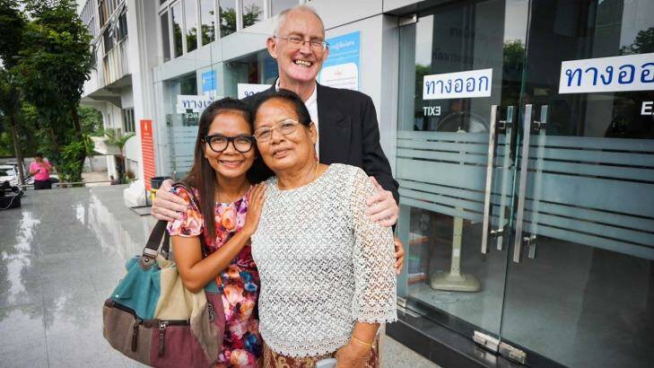 Alan Morison and Chutima Sidasathian with Chutima's mother after their acquittal in Phuket. Photo: Dan Miles