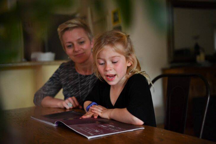 Niki Burrows with her daughter Goldie who is in grade 1. Nikki is in favour of phonics testing. 22nd September 2017. The Age Fairfaxmedia News Picture by JOE ARMAO