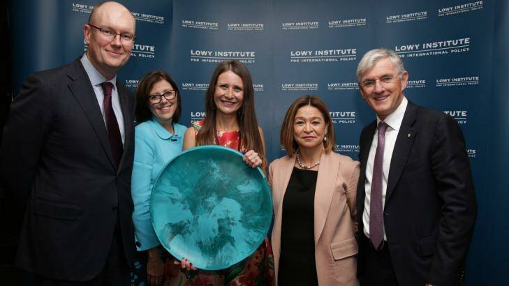 Fairfax Media's Indonesia correspondent Jewel Topsfield accepts the 2016 Lowy Institute Media Award in Sydney on Thursday night. From left to right: Michael Fullilove, Jane Anderson, Jewel Topsfield, Michelle Guthrie and Steven Lowy. Photo: Peter Morris/SydneyHeads.com
