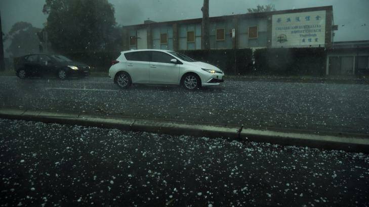 Hail falls in Hornsby on Saturday afternoon. Photo: Nick Moir
