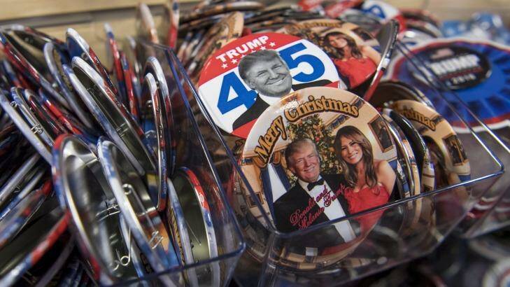 Pressing buttons: Presidential inauguration souvenirs on sale at the White House. Photo: David Paul Morris