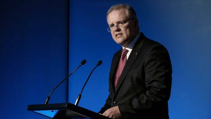 Treasurer Scott Morrison says the government's goal is to deliver a better tax system with a better mix. Photo: Luis Ascui