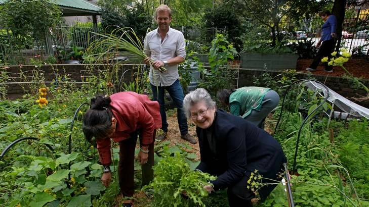 Campaign: Bill Granger with Redfern residents in their market garden. Photo: Ben Rushton