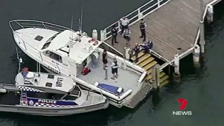 Water police and paramedics at Clareville on Thursday afternoon. Photo: Seven News