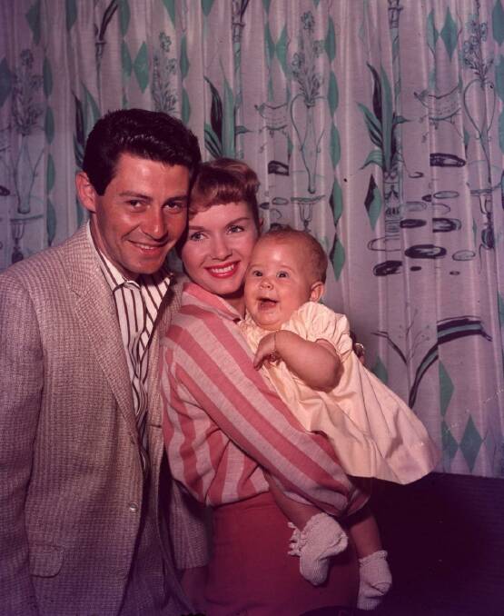 Happy family: Eddie Fisher, Debbie Reynolds and daughter Carrie in 1957. Photo: Hulton Archive