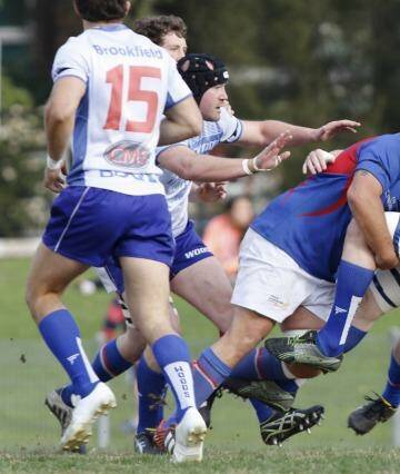 Caught: Eastwood’s Jarryd Barry is tackled during Saturday’s win. Photo: Quentin Jones