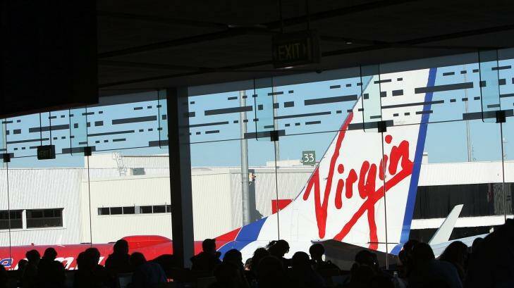 The deal frees funds to expand the airline's frequent flyer program, Virgin says. Analysts believe the money will be needed to fund operating losses after Virgin took full control of Tigerair. Photo: Peter Braig