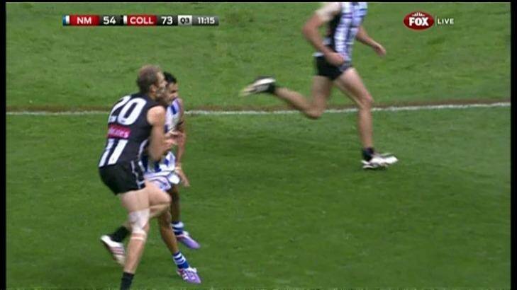 Lindsay Thomas collides with the Magpies' Ben Reid in Round 1, 2013. Photo: Fox Footy