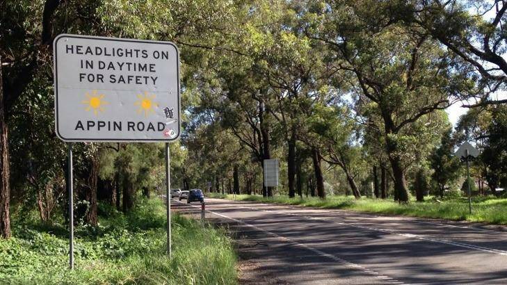 Drivers are warned to turn headlights on in daytime for safety at the beginning of Appin Road. Photo: Saskia Mabin
