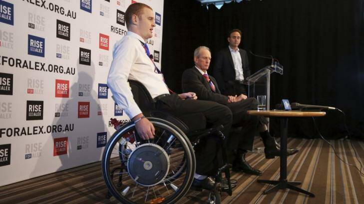 Inspiration: Alex McKinnon, with Knights coach Wayne Bennett, addressing the media during the week. Photo: Kate Geraghty