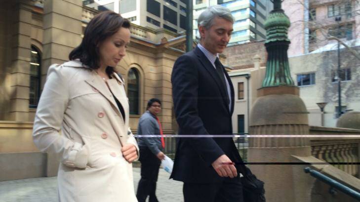Benjamin Hampton's wife Louise and lawyer Gordon Elliot leave court after the bail hearing. Photo: Louise Hall