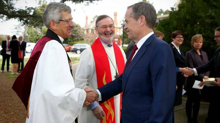 Opposition Leader Bill Shorten is welcomed to the Ecumenical Service to mark the opening of the 45th Parliament at the Church of St Andrew in Canberra. The same-sex marriage confrontation occurred after the ceremony. Photo: Alex Ellinghausen
