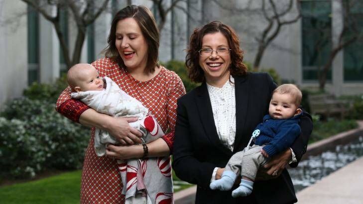 Kelly O'Dwyer with her daughter Olivia and Amanda Rishworth with her son Percy at Parliament House in Canberra on Wednesday. Photo: Andrew Meares
