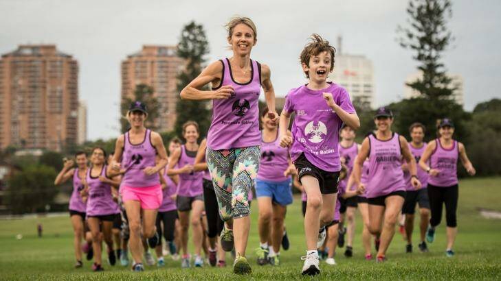 Sophie Smith's eight-year-old son Owen says he wants to take over her half marathon group Running for Premature Babies once she retires. Photo: Wolter Peeters