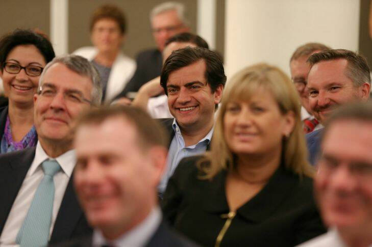 Senator Sam Dastyari listens as Opposition Leader Bill Shorten addresses caucus meeting at the Opposition party room at Parliament House in Canberra on Tuesday 23 February 2016. Photo: Alex Ellinghausen
