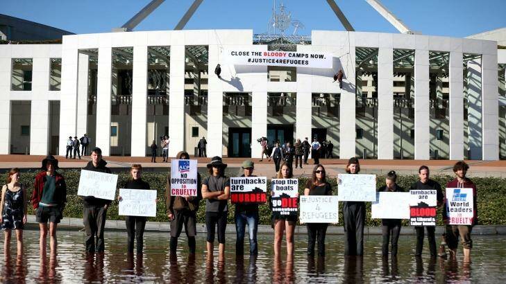 Protestors on the forecourt of Parliament House in Canberra on Thursday 1 December 2016. Photo: Alex Ellinghausen