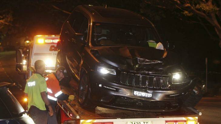 The car that Buddy Franklin was driving is towed away from Rose Bay. Photo: Britta Campion