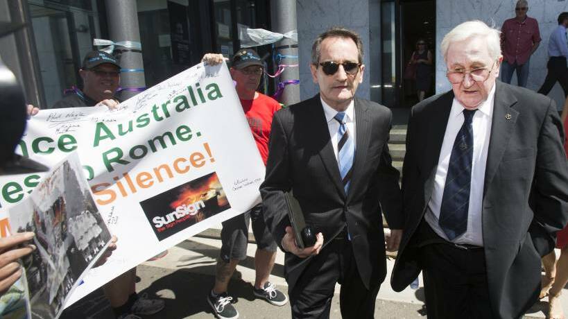 FAILED TO ACT: Former St Patrick's headmaster Paul Nangle (right) leaves the sex abuse inquiry at the Ballarat Magistrates Court on Tuesday with Truth Justice Healing CEO Frank Sullivan. Photo: SIMON O'DWYER