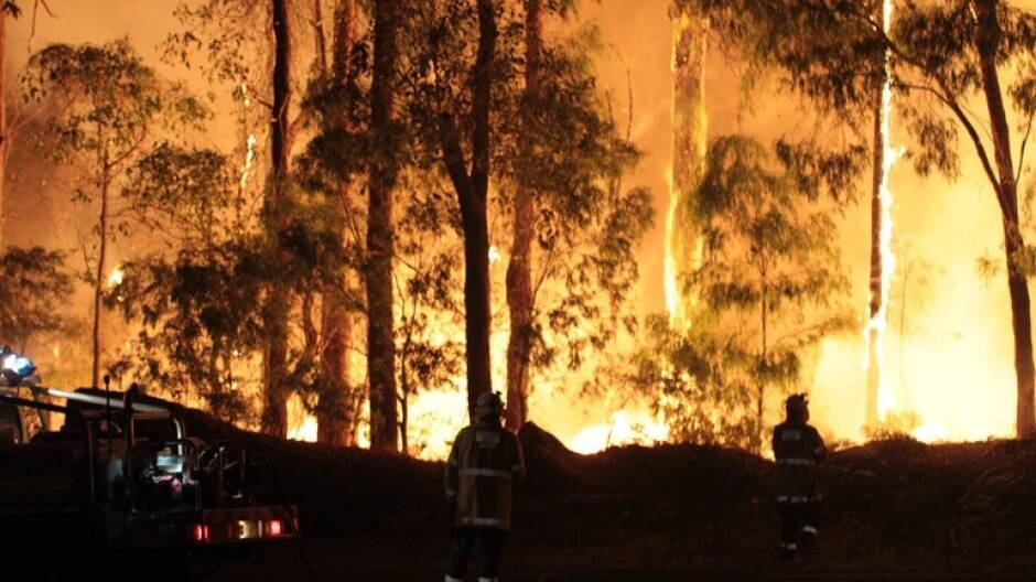 The Department of Fire and Emergency Services has captured some amazing images of firefighters tackling the massive blaze confronting Northcliffe in WA. Photo: Department of Fire and Emergency Services