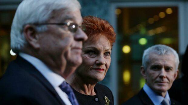 One Nation senators Brian Burston, Pauline Hanson and Malcolm Roberts announce the deal. Photo: Alex Ellinghausen
