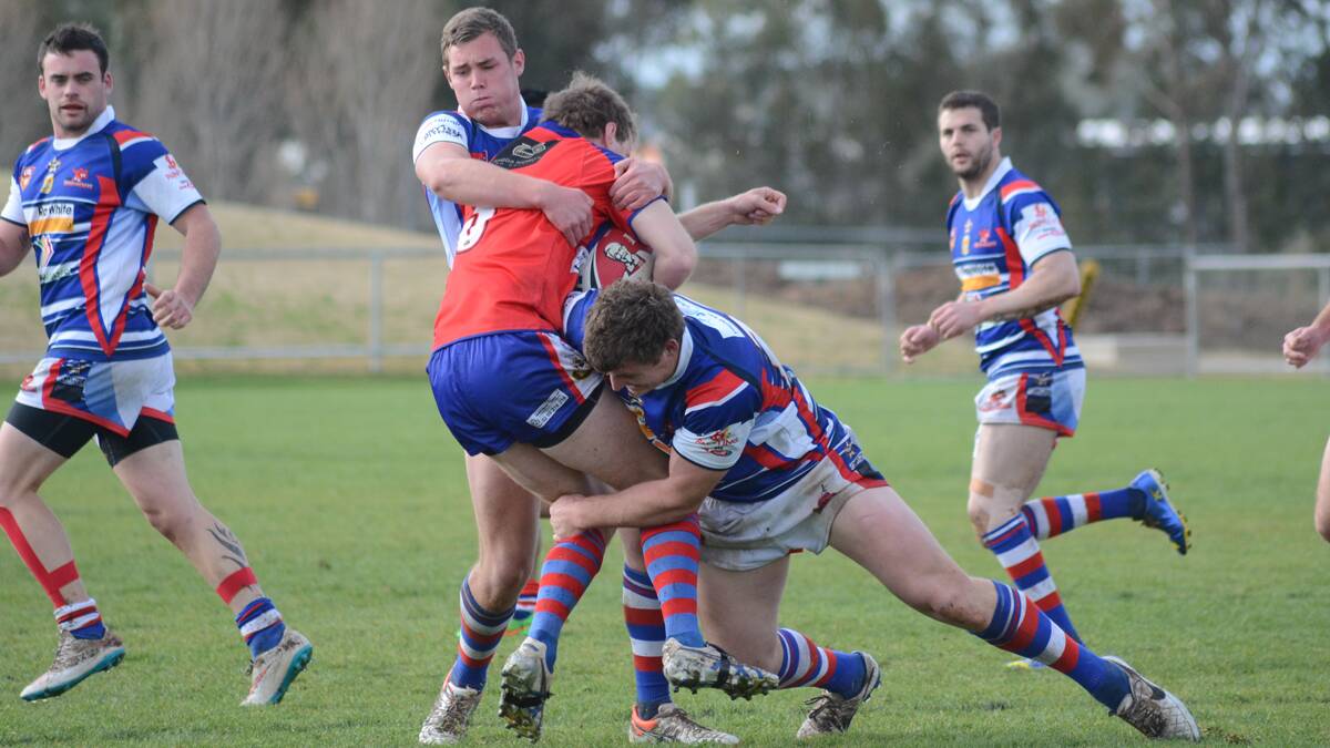‘PICKERS: Young Cherrypickers Jayke Hogan and Aaron Slater in action during the First Grade match against Wagga Kangaroos on Sunday. Photo: Elouise Hawkey.