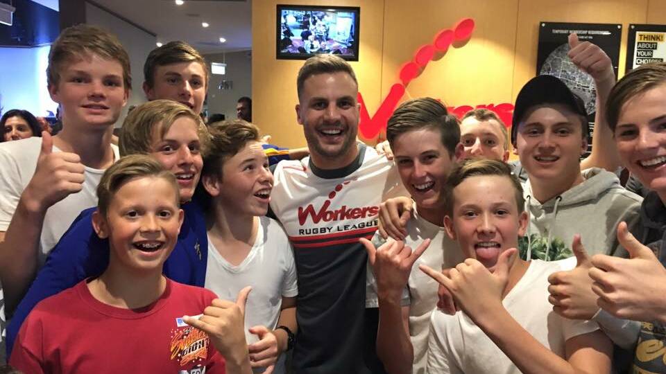 STARSTRUCK: Young High School students (back) Jack Rolfe, Steven Anderson, Liam McLachlan, (centre) Ben Baker, Oliver Pettit, Jacob Lucas, Jake Davis, (front) Nathan Goonan, Cooper Silk, and Brandon Sanderson pictured with NRL legend Beau Ryan. 					(sub)