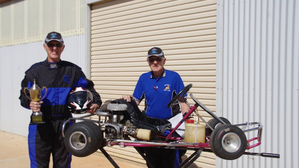 TOP KARTER: Young’s Clive Lacey had the best lap time at the 2015 Grand National Vintage Kart Meeting, being named Top Gun Era 2. He is pictured with his brother Doug Lacey from Sydney.   (sub)