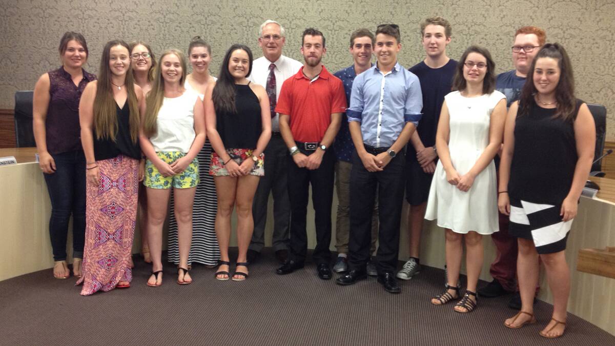 RECIPIENTS: Of this year’s mayoral scholarships pictured with Young’s mayor John Walker (centre) were (left to right) Jasmine Downey, Paige Hall, Tahlia Johnson, Kate Grimson, Stephanie Hall, Nick Fitzpatrick, Sam Langfield, Tim Langfield, Jake McIllhatton, Tegan Walker, James Cahill and Claudia Wood. Absent: Emily Jones, William Murphy and Torren-Claire McEvoy. 